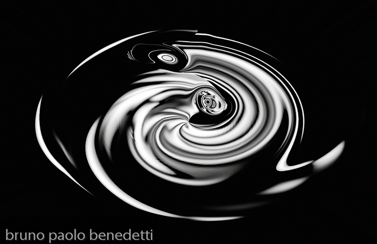 on black background abstract silver light vortex